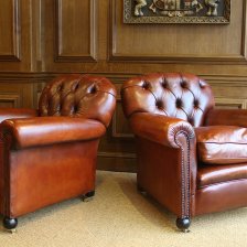 Buttoned Back Antique Pair of Leather Club Chairs